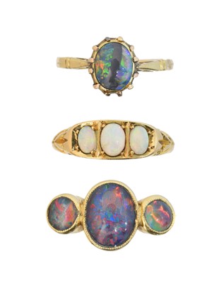 Lot 134 - Three opal dress rings