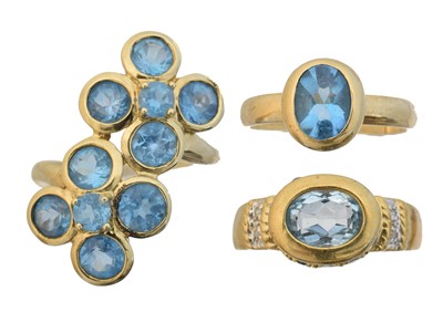 Lot 70 - Three 9ct gold blue topaz dress rings