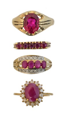 Lot 69 - Four 9ct gold ruby dress rings