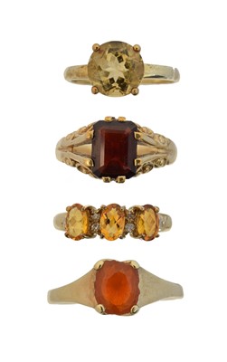 Lot 119 - Four 9ct gold gem-set dress rings