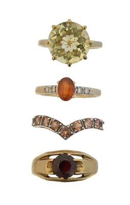 Lot 114 - Four 9ct gold gem-set dress rings