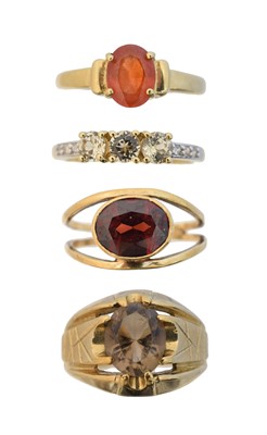 Lot 111 - Four 9ct gold gem-set dress rings