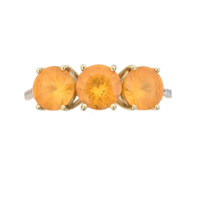 Lot 44 - A 9ct gold orange gem and diamond dress ring