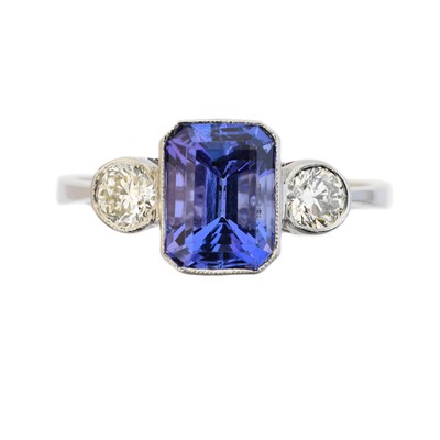 Lot 79 - A tanzanite and diamond three stone ring