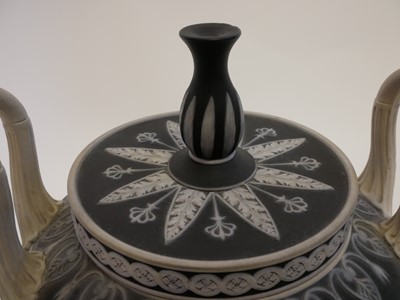 Lot 204 - Wedgwood twin handled black jasper dip vase