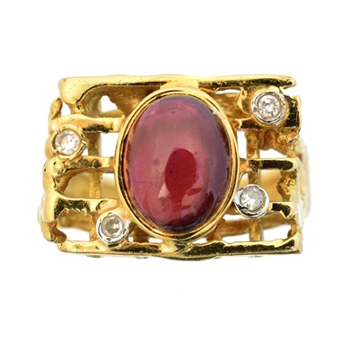 Lot 120 - A 1960s garnet and diamond dress ring by George Weil
