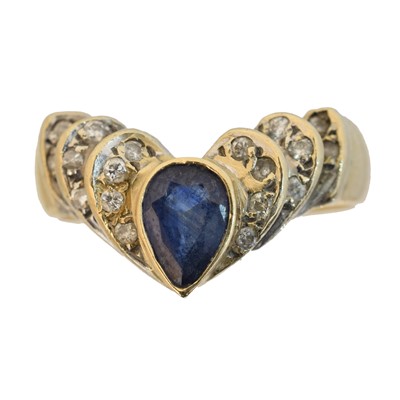 Lot 141 - An 18ct gold sapphire and diamond dress ring