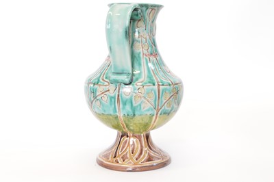 Lot 69 - Della Robbia twin handled footed vase