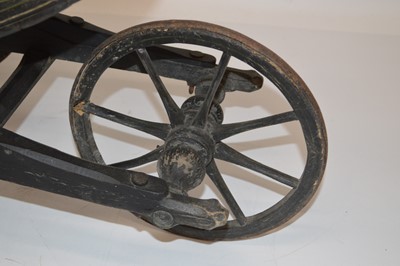 Lot 232 - Victorian black painted pine child's pushchair