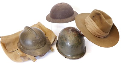 Lot 374 - Three helmets, a bag and a hat