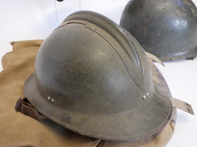 Lot 374 - Three helmets, a bag and a hat