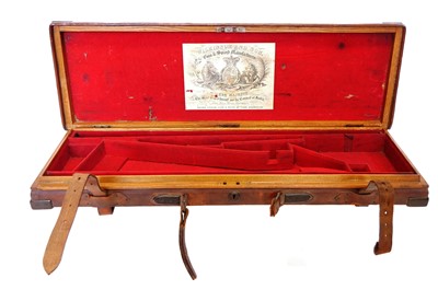Lot 257 - Leather and oak gun case for Wilkinson of London