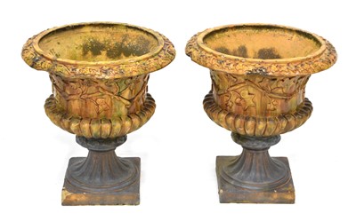 Lot 420 - A pair of salt glazed campana-shaped garden urns
