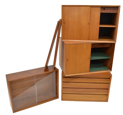 Lot 260 - Four teak wall units and two shelves retailed by Heals