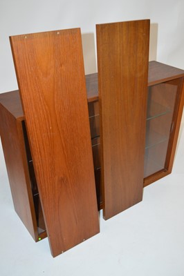 Lot 260 - Four teak wall units and two shelves retailed by Heals