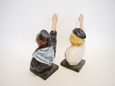 Lot 286 - Pair of Italian Youth Facist pottery figures