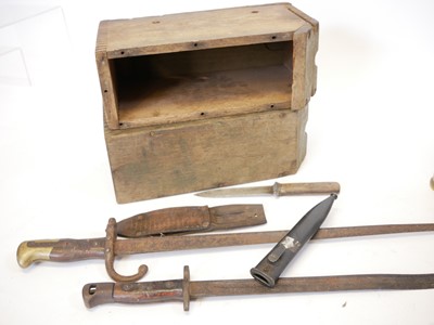 Lot 285 - Two Browning machine gun wood cases, three 40mm Bofors shells, two bayonets, and a knife