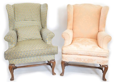 Lot 358 - A pair of wingback armchairs