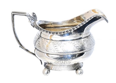 Lot 99 - A George IV silver millk jug