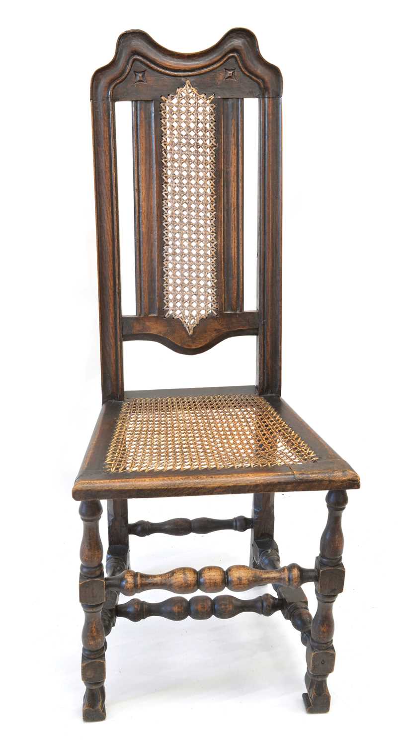 Lot 243 - 18th-century oak high back single chair
