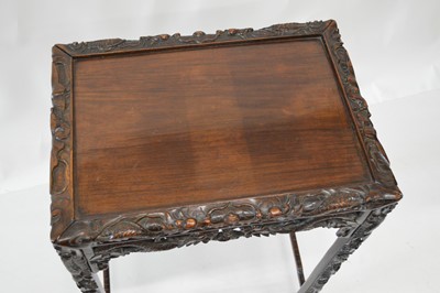 Lot 271 - Late 19th-century Burmese carved rosewood side table