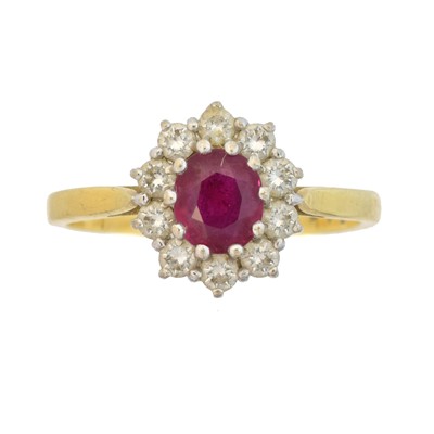 Lot 121 - An 18ct gold ruby and diamond cluster ring