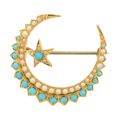 Lot 23 - A turquoise and split pearl crescent brooch