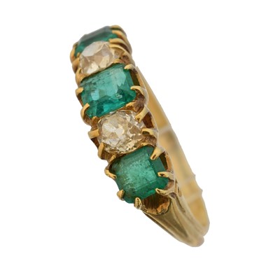 Lot An emerald and diamond five stone ring