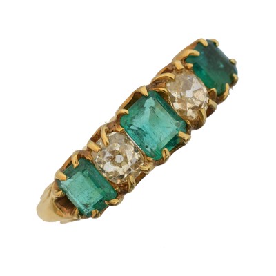 Lot An emerald and diamond five stone ring
