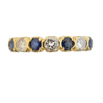 Lot 42 - An 18ct gold sapphire and diamond band ring