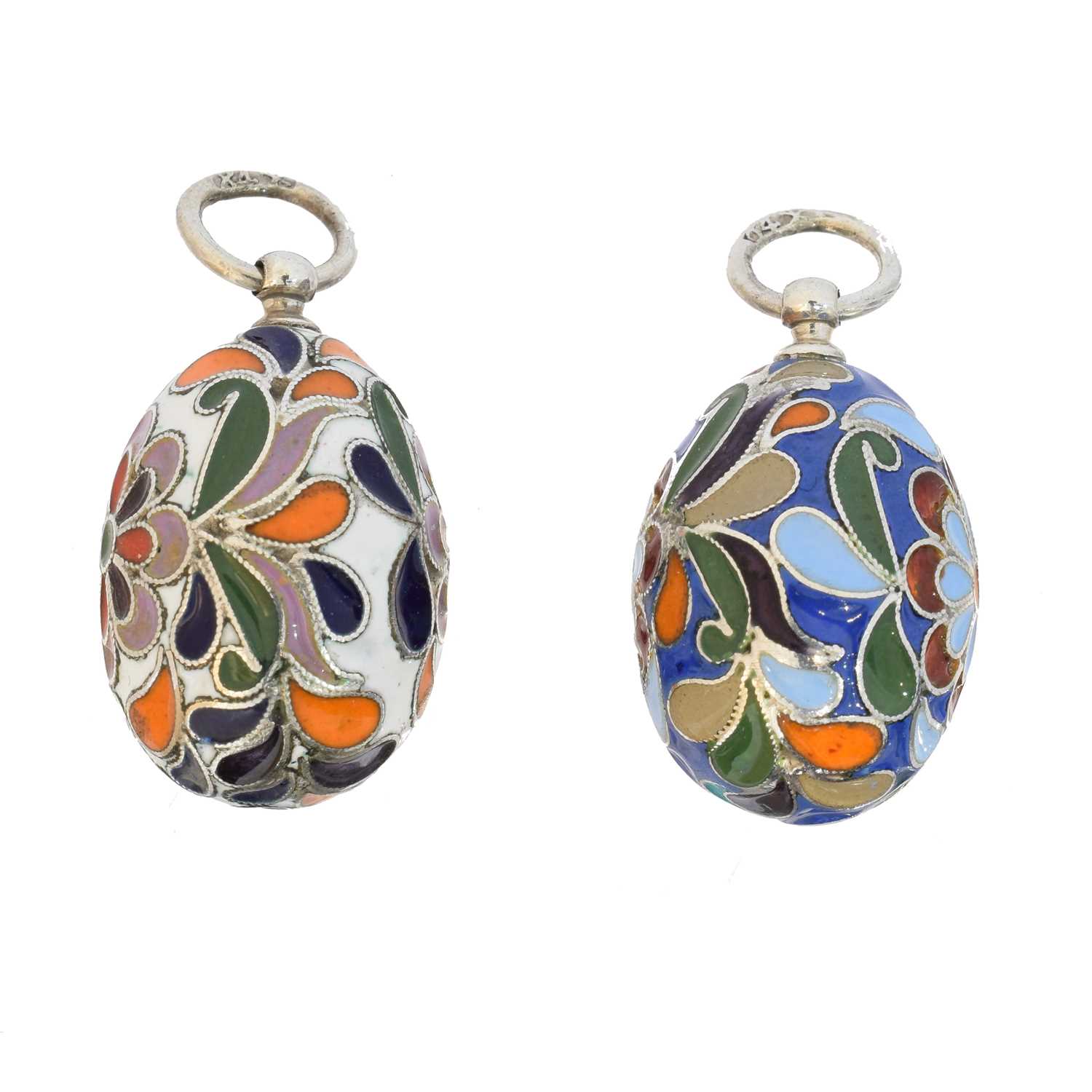 Lot 58 - Two silver enamel egg pendants