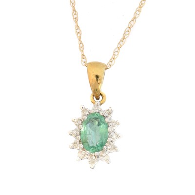 Lot 15 - A 9ct gold emerald and diamond pendant