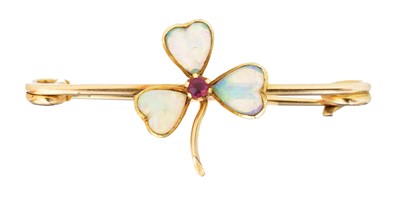 Lot 9 - An early 20th century opal and ruby brooch