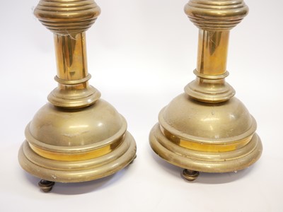 Lot 221 - Pair of Victorian gothic brass candlesticks