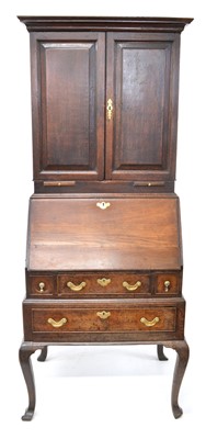 Lot 402 - Mid-18th-century oak bureau bookcase