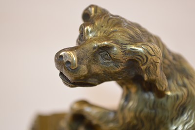 Lot 62 - Ormolu figure group of a dog protecting a child