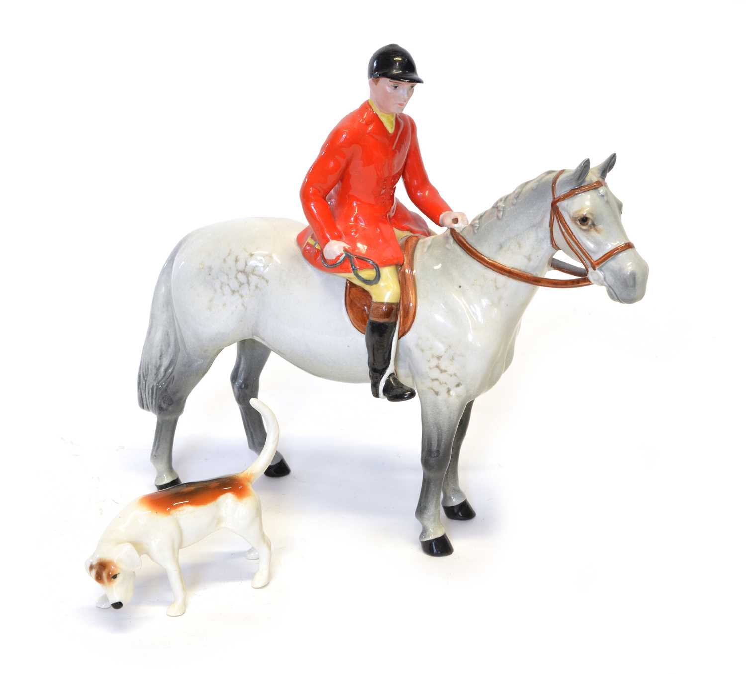 Lot 76 - Beswick Huntsman and hound