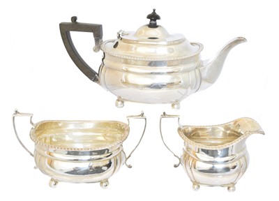 Lot 106 - A George V silver three piece tea set