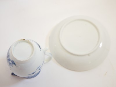 Lot 132 - Lowestoft cream jug and saucer