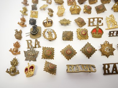 Lot 255 - Collection of cap badges, collar titles and uniform appointments