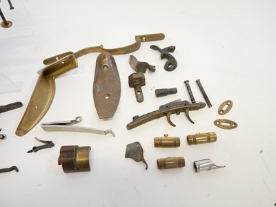 Lot 486 - Reproduction muzzle loader locks and related items
