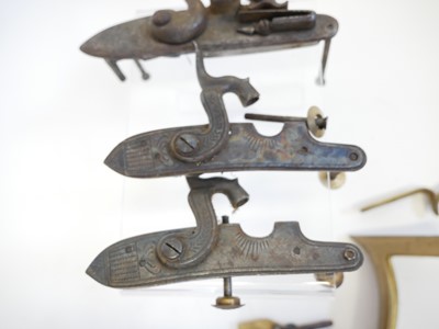 Lot 486 - Reproduction muzzle loader locks and related items