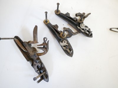 Lot 486 - Reproduction muzzle loader locks and related items