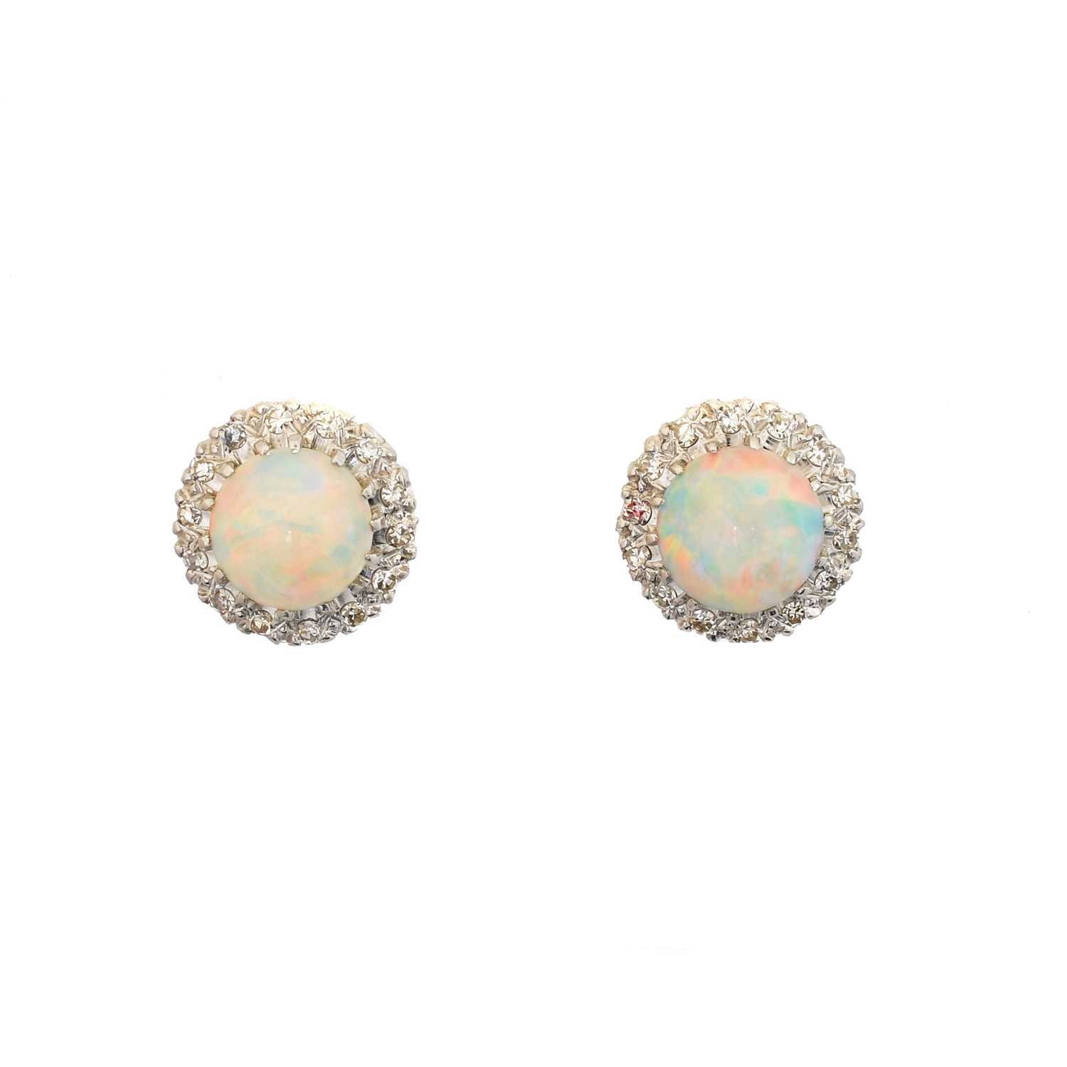 Lot A pair of opal and diamond earrings