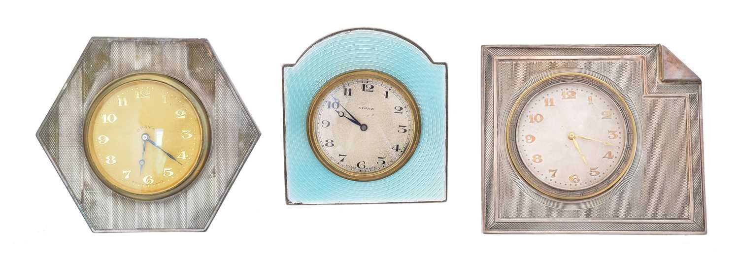 Lot 78 - Three silver fronted travel clocks