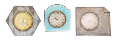 Lot 78 - Three silver fronted travel clocks