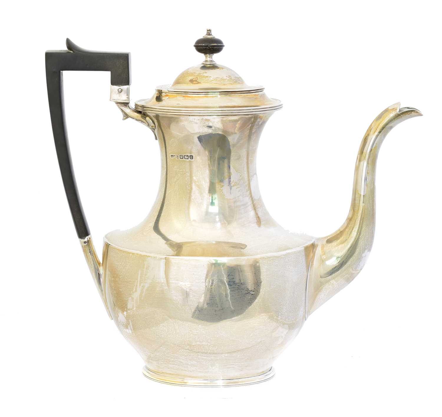 Lot 84 - A George V silver teapot