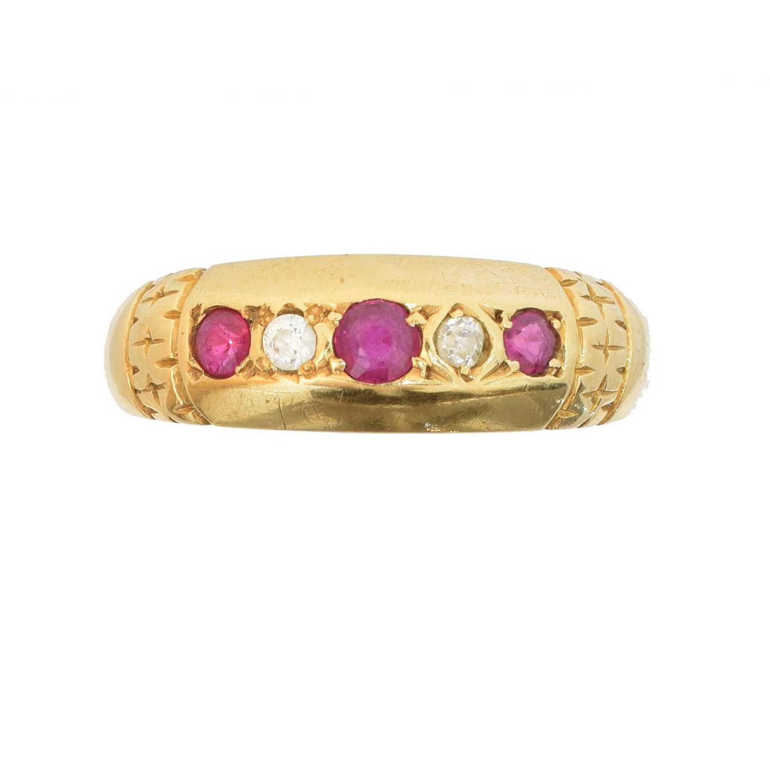 Lot An 18ct gold ruby and diamond five stone ring