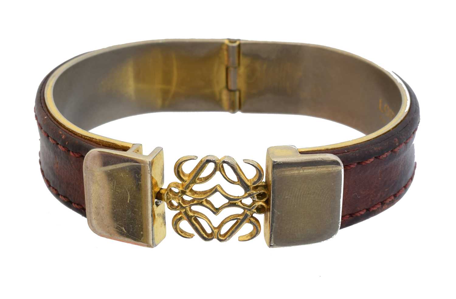 Lot 48 - A Loewe 'Anagram' bangle bracelet