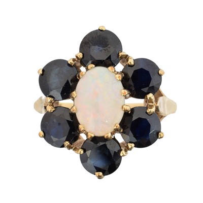 Lot 43 - A 9ct gold opal and sapphire cluster ring